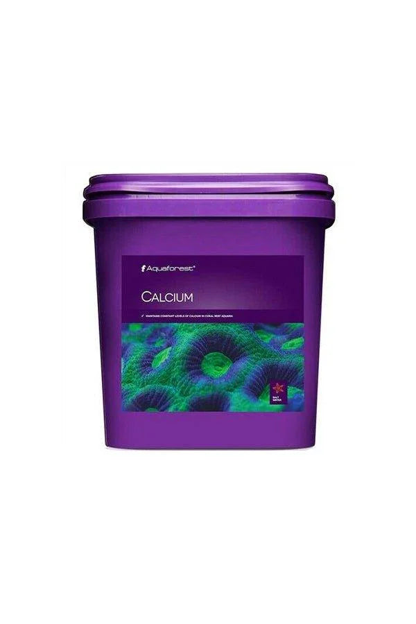 Purple container of aquarium calcium supplement for reef tank corals, Aquaforest label visible