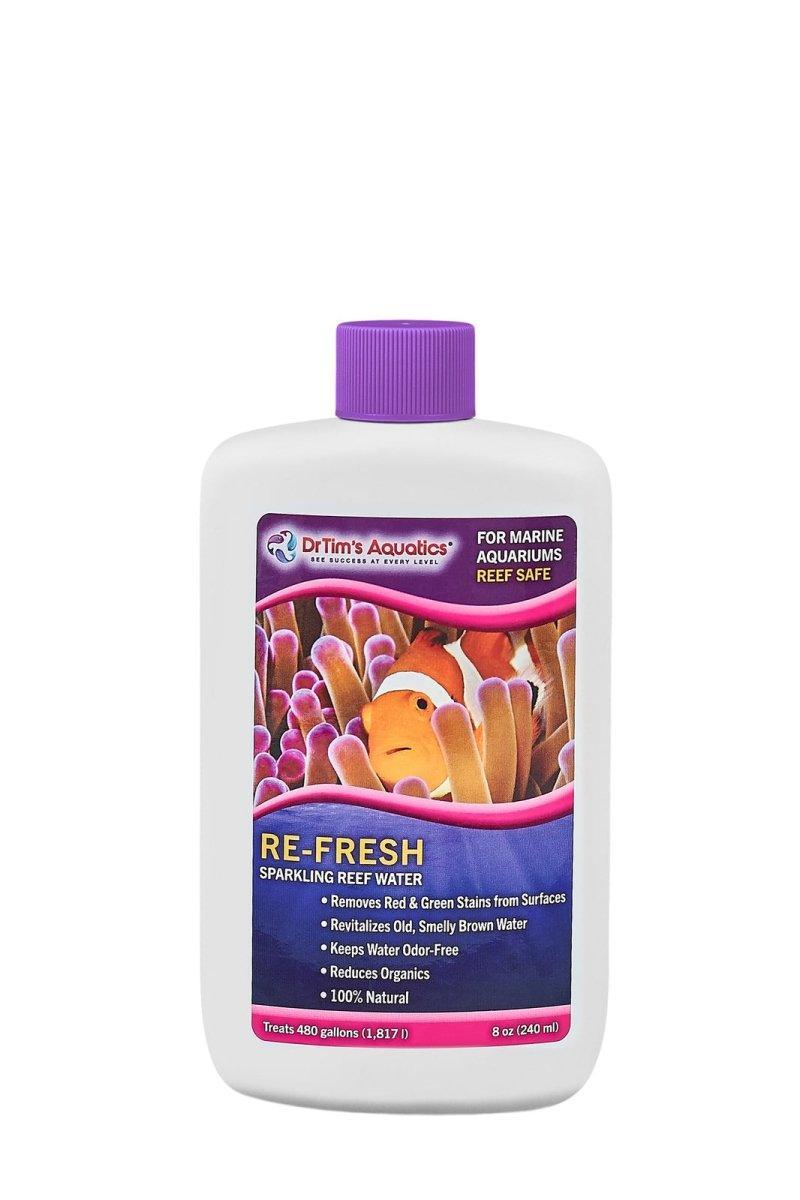 240ml bottle of aquarium water treatment with purple cap, label shows clownfish and anemone.